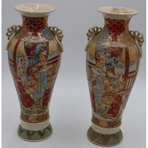 78 - A pair of Satsuma round bulbous thin necked trumpet shaped vases on multi-coloured grounds with figu... 