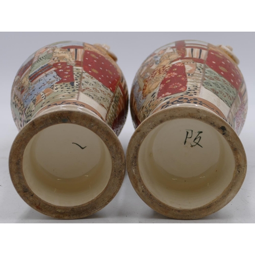 78 - A pair of Satsuma round bulbous thin necked trumpet shaped vases on multi-coloured grounds with figu... 