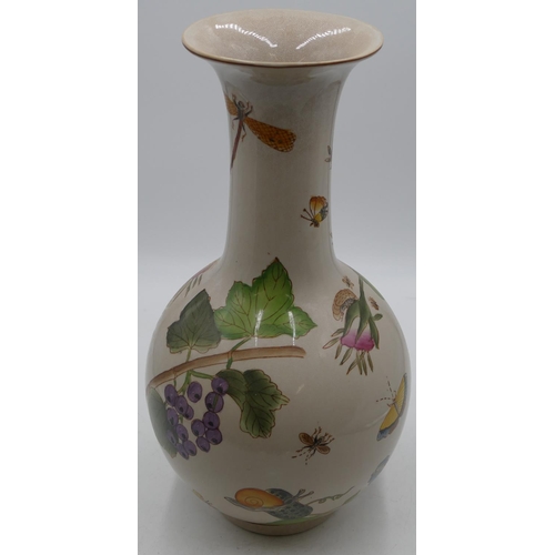 79 - A modern Oriental round bulbous shaped thin necked trumpet shaped vase with multi-coloured inset but... 