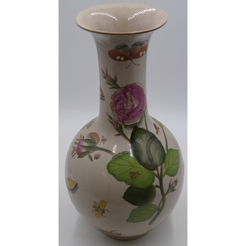 79 - A modern Oriental round bulbous shaped thin necked trumpet shaped vase with multi-coloured inset but... 