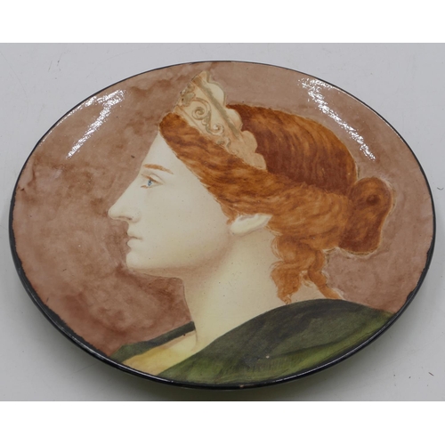 83 - A Dalton & Co Lambeth painted earthenware plate depicting figurehead of a lady, numbered 31, 30.5cm ... 