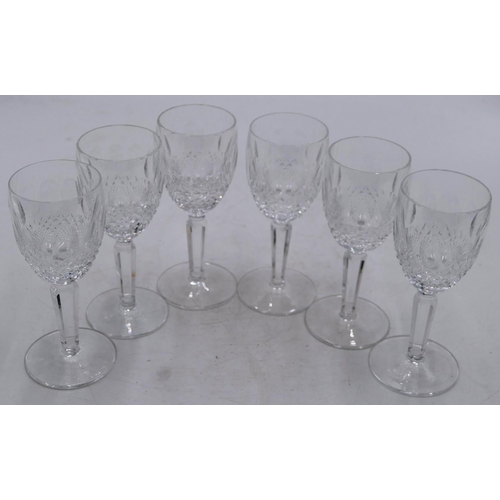 86 - A set of 6 Waterford wine glasses with thumb pattern and tooth cut decoration, hexagonal stems on ro... 