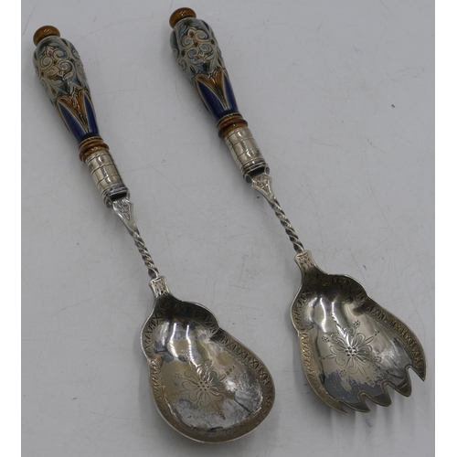 9 - A pair of Royal Doulton base stoneware handled salad servers with silver-plated bowls (2)