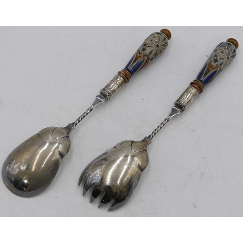 9 - A pair of Royal Doulton base stoneware handled salad servers with silver-plated bowls (2)