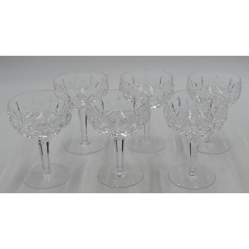 90 - A set of 6 Waterford cut glass champagne coupes on hexagonal stems with round bases, 13.2cm high.