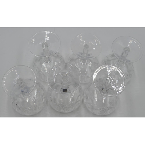 90 - A set of 6 Waterford cut glass champagne coupes on hexagonal stems with round bases, 13.2cm high.