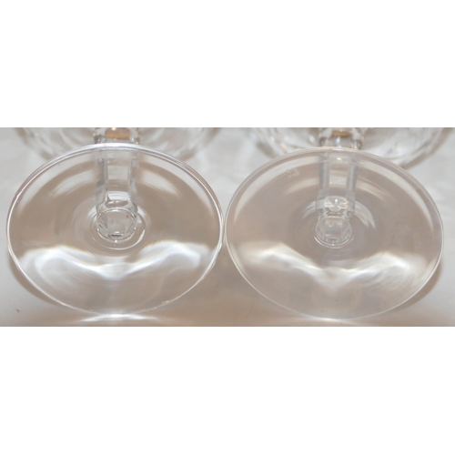 90 - A set of 6 Waterford cut glass champagne coupes on hexagonal stems with round bases, 13.2cm high.