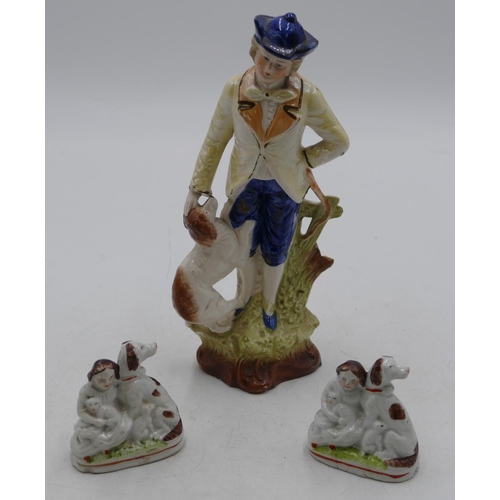 92 - A pair of Victorian small Staffordshire groups of seated children with dogs and puppies, 7cm high an... 