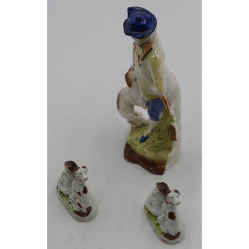 92 - A pair of Victorian small Staffordshire groups of seated children with dogs and puppies, 7cm high an... 