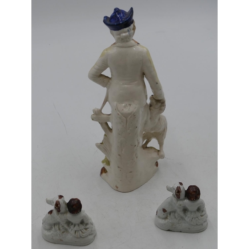 92 - A pair of Victorian small Staffordshire groups of seated children with dogs and puppies, 7cm high an... 