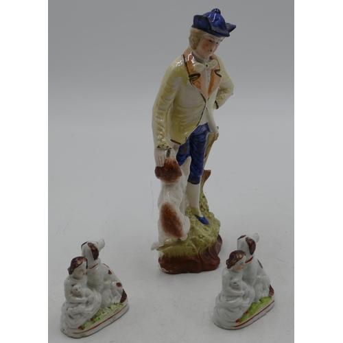 92 - A pair of Victorian small Staffordshire groups of seated children with dogs and puppies, 7cm high an... 