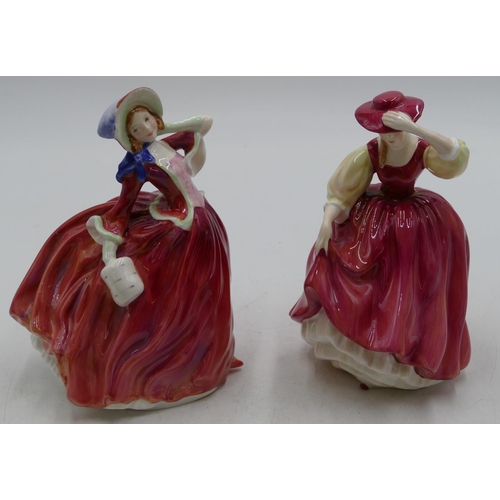 93 - 2 Royal Doulton figurines of ladies in red dresses 