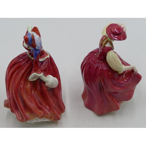 93 - 2 Royal Doulton figurines of ladies in red dresses 