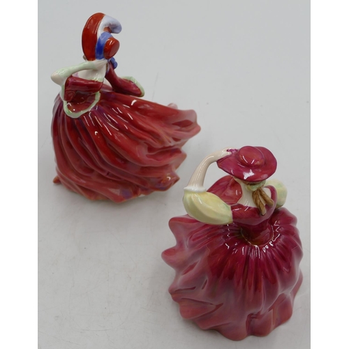 93 - 2 Royal Doulton figurines of ladies in red dresses 