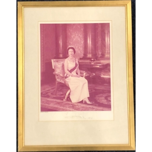 126 - A signed photograph of The Late Queen Elizabeth II, signed Elizabeth R 1972, print by Anthony Buckle... 