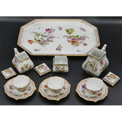 116 - A Dresden Cabaret tea and coffee service on white ground with hand painted floral, leaf and gilt dec... 