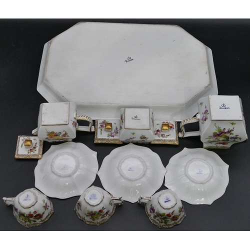 116 - A Dresden Cabaret tea and coffee service on white ground with hand painted floral, leaf and gilt dec... 