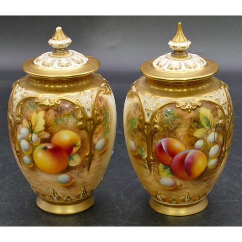 119 - A pair of Royal Worcester round bulbous thin necked lidded vases decorated by Frank Roberts on white... 