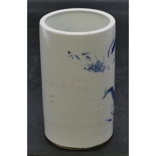 126 - An Oriental cylindrical brush pot on blue and white ground with shrimp decoration, 14cm high.