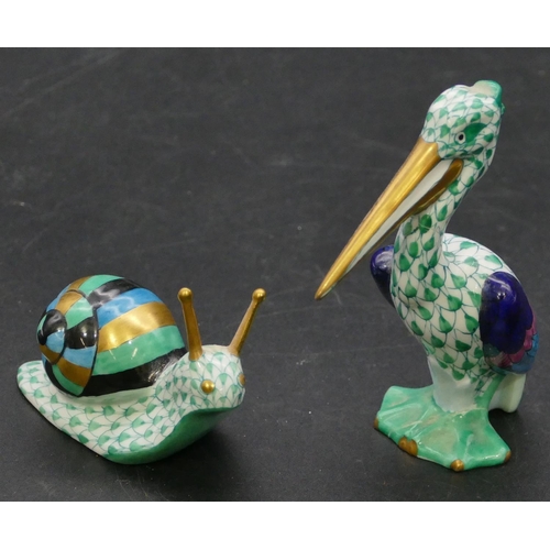 13 - A Herend figure of a snail on white and green ground, 78cm long and a Herend figure of a pelican, 8.... 