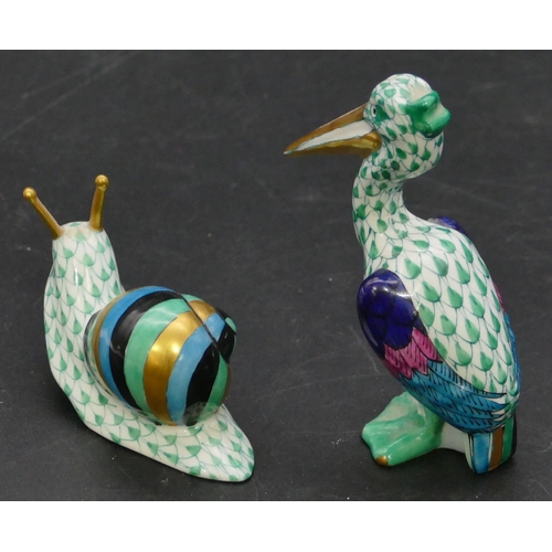13 - A Herend figure of a snail on white and green ground, 78cm long and a Herend figure of a pelican, 8.... 