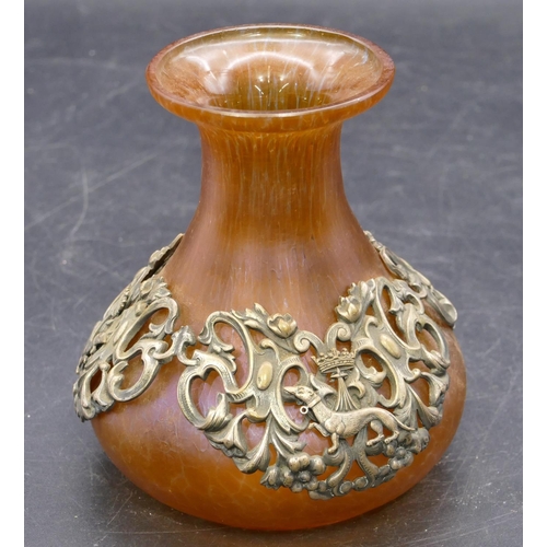 136 - A Loetz style round bulbous thin necked trumpet shaped vase on orange ground with silver plated band... 