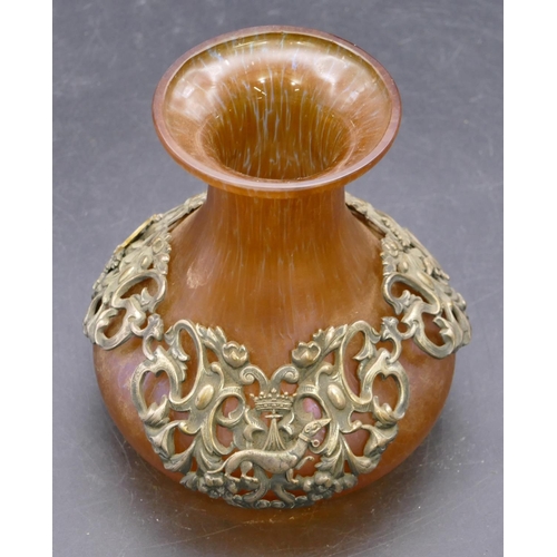 136 - A Loetz style round bulbous thin necked trumpet shaped vase on orange ground with silver plated band... 