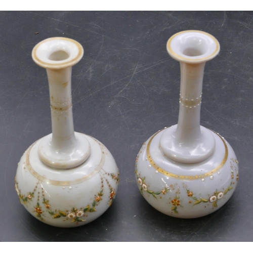 137 - A pair of Victorian opaline glass round bulbous thin necked trumpet shaped vases with raised painted... 