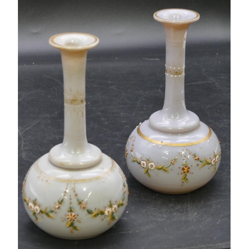 137 - A pair of Victorian opaline glass round bulbous thin necked trumpet shaped vases with raised painted... 