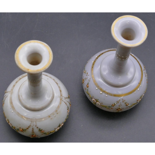 137 - A pair of Victorian opaline glass round bulbous thin necked trumpet shaped vases with raised painted... 