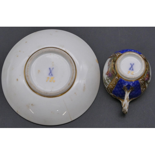 141 - A Meissen style cup and saucer on white and blue ground with hand painted figure, landscape and gilt... 