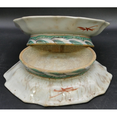 143 - A pair of Oriental round scallop shaped shallow comports on white and turquoise ground with butterfl... 