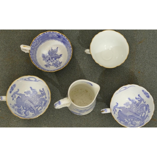 150 - A Spode Camilla blue and white trio, a Victoria Austria china trio with multi-coloured floral, leaf ... 