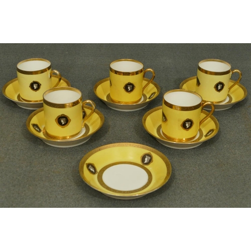 151 - A set of 5 Naples porcelain coffee cans, 6 saucers on white and yellow ground with black and white f... 