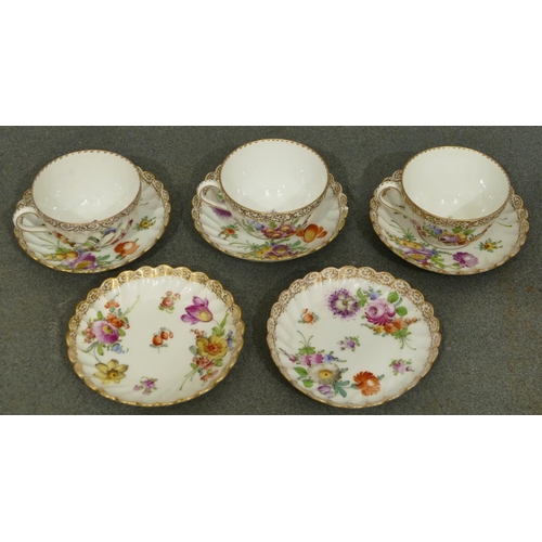 153 - A set of 3 Dresden tea cups and 5 matching saucers with crinkled rims on white ground with multi-col... 