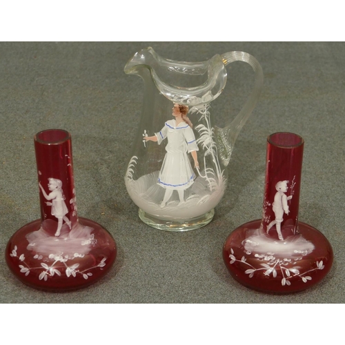 155 - A pair of cranberry Mary Gregory bulbous think necked vases depicting children, 10.5cm high, a clear... 