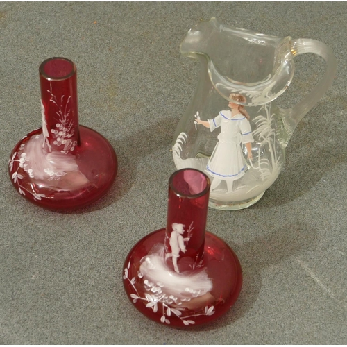 155 - A pair of cranberry Mary Gregory bulbous think necked vases depicting children, 10.5cm high, a clear... 