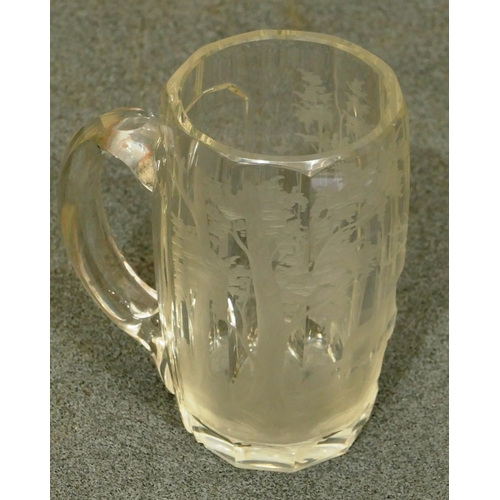 157 - A clear glass half pint tankard with engraved stag and landscape decoration, 12cm high