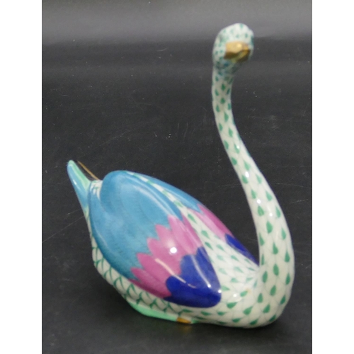 17 - A Herend figure of a swan on white and green ground, 14cm high.