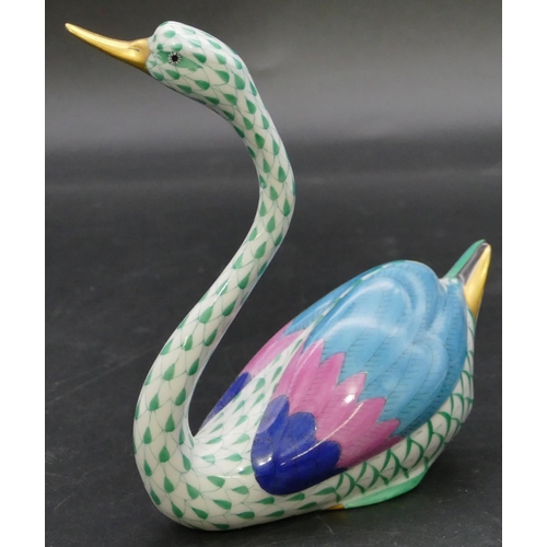 17 - A Herend figure of a swan on white and green ground, 14cm high.