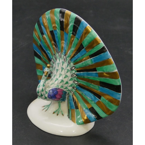 18 - A Herend figure of peacock, 11.5cm high.