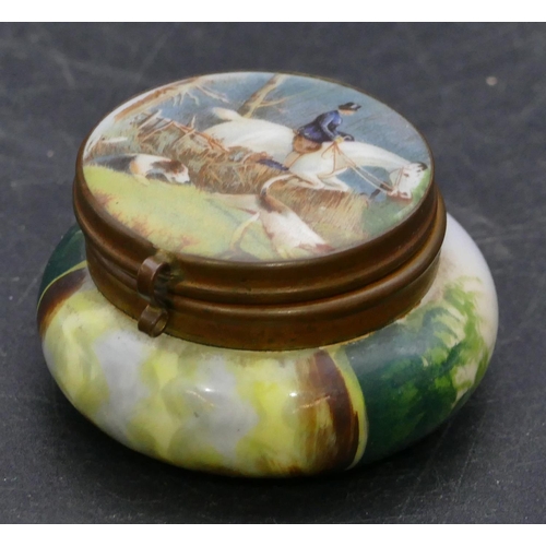 182 - A porcelain round bulbous shaped patch box with all over hunting scene decoration, hinged lid enclos... 