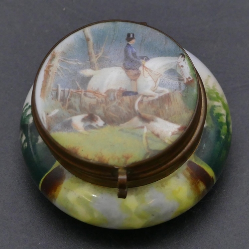 182 - A porcelain round bulbous shaped patch box with all over hunting scene decoration, hinged lid enclos... 