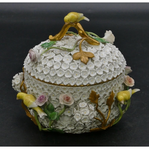 187 - A Meissen lidded pot with all over raised encrusted floral and branch decoration, mounted with 4 yel... 