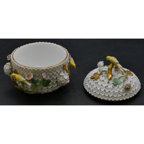 187 - A Meissen lidded pot with all over raised encrusted floral and branch decoration, mounted with 4 yel... 