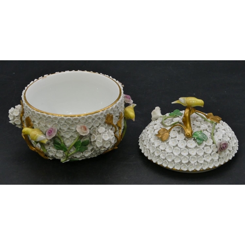 187 - A Meissen lidded pot with all over raised encrusted floral and branch decoration, mounted with 4 yel... 