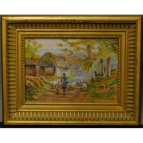 190 - F Clark rectangular porcelain plaque depicting shepherd and sheep in country lane, signed, in gilt f... 