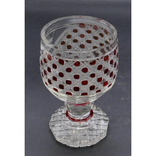 194 - A ruby and clear cut glass round trumpet shaped tumbler with engraved stags head motif on bulbous st... 