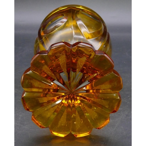 196 - An amber glass round bulbous shaped tumbler with etched figure decoration 