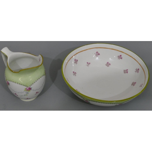 2 - A Royal Doulton small round bulbous shaped toilet jug and basin on white and pale green ground with ... 
